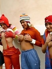 Four funny teen girls flashing their busty and small breasts and tight butts outdoors